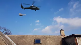 UH-60 Blackhawk escorting a spaceship.