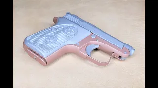 Rose Gold & Silver Beretta 950 BS pistol