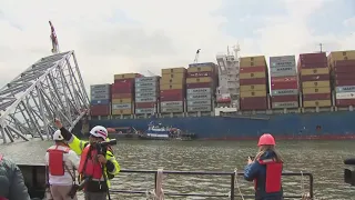 First cargo ship passes through newly opened channel in Baltimore
