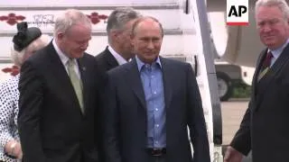 Russia President Putin and German Chancellor Merkel arrive for G8 summit