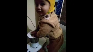 baby play with mixer grinder