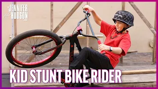 10-Year-old Stunt Bike Rider Shows Jennifer Hudson How to Do a Wheelie!