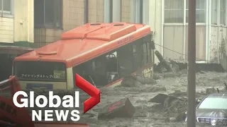 Wall of mud slams into row of houses in Japanese town, at least 20 missing