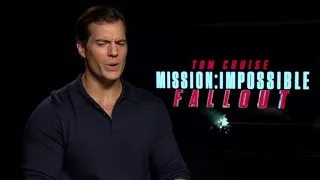 Henry Cavill is still getting used to calling Tom Cruise “Tom”…