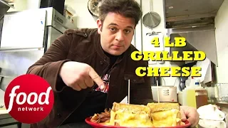 Adam Finds Out How Much Dairy His Body Can Take After Trying The 4 LB Grilled Cheese | Man v Food