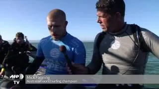 Surf pro fights off S.Africa shark attack on live TV