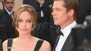 Angelina Jolie and Brad Pitt poses at FRANCE