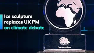 Ice sculpture replaces UK PM on climate debate