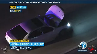 Chase ends in downtown LA after suspect's car hood pops open | ABC7