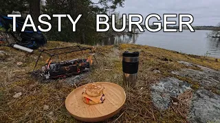 Cooking Burger over the Fire on an Island