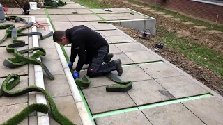 Installation of Royal Grass artificial grass in strips