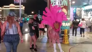 LAS VEGAS SHOWGIRL SHOWING OFF FOR THE CAMERA ON LAS VEGAS BLVD