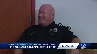 Omaha police officer signs off for the final time after working the streets for over three decades