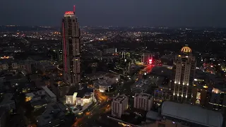 Night flight over Sandton City in 4K.