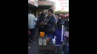 blind man playing PUSONG BATO at baguio city