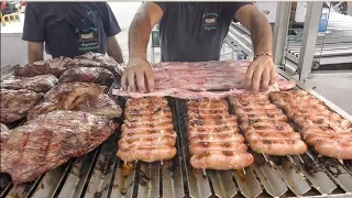 Italy Street Food. Huge Grills with Lots of Meat on Fire