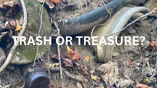 TRASH OR TREASURE? SHOULD WE INVESTIGATE THIS MASSIVE SINK HOLE'S EXPOSED ARTIFACTS?