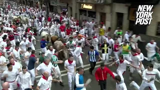 Thousands take part in first running of the bulls in Spain’s San Fermin festival