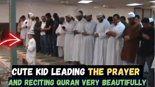 A CUTE KID LEADING THE PRAYER & RECITING QURAN BEAUTIFULLY !