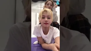 Nayeon sitting on Sana's butt during Vlive