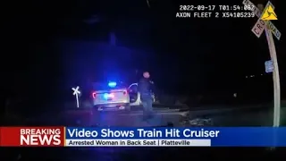 Police video shows the moment a train smashes into Platteville cruiser with woman inside