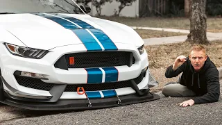 How to drive a low car in and out of a steep driveway.