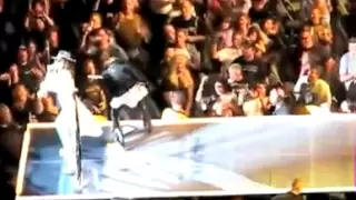 Joe Perry pushes Steven Tyler off a stage