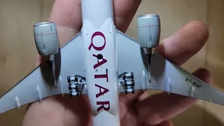 unboxing the ng models 1 400 scale qatar airways 777-300er int the "one world" livery