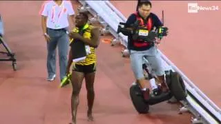 Cameraman on Segway Takes Down Usain Bolt | Usain Bolt Fall Down in China