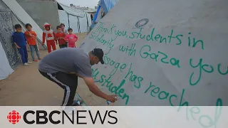 Displaced Palestinians in Gaza display thanks to U.S. protesters