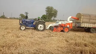 Farmtrac champion (39hp) टैक्टर पर रीपर चलाते