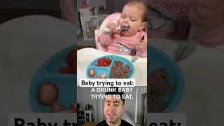 Baby tries to eat a strawberry 🍓