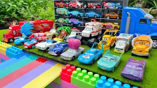 Pixar's: Cars On The Road | Lightning McQueen, Sally, Tow Mater, Mack Truck, Doc Hudson, Chick Hicks