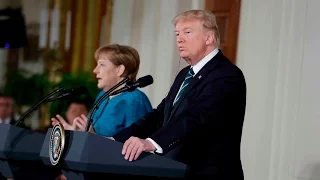 Trump tells Merkel: 'At least we have something in common, perhaps'