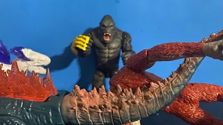 Godzilla and Kong throwing Skar King Stop Motion