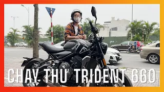 Mưa gió lượn lên Triumph Hà Nội chơi