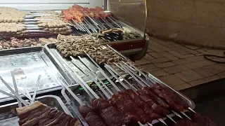 Street food at Samarkand, Uzbekistan. Beef, chicken, mutton, fish. Must try local dishes.