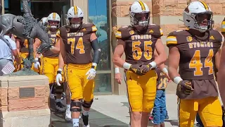 Wyoming Cowboys Football team coming out to warm up vs Portland State 9-9-23