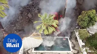 La Palma volcano: Drone footage captures moment lava destroys swimming pool