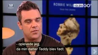 Robbie Williams interview danish Morning-TV part 1(strip-tattoo)