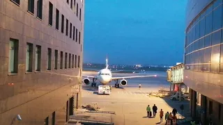 A321 Red wings at night. Wiew from terminal SVX