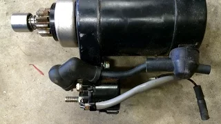 Adding a starter motor to an outboard motor