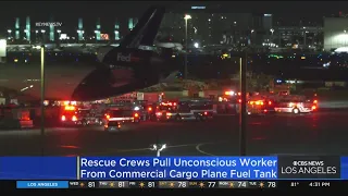 Worker pulled from cargo plane fuel tank at LAX