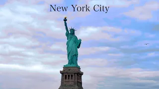 New York City by Drone over Central Park Lower Manhattan Statue Of Liberty and the 9-11 Memorial