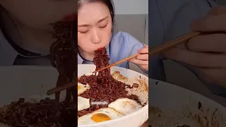 Blackbean Noodles With Fried Eggs