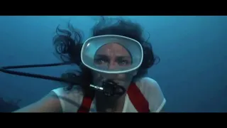 Jaqueline Bisset scuba diving with white wet t-shirt. The Deep Movie