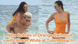 Nina Dobrev in Orange Swimsuit with Shaun White at Tulum Beach