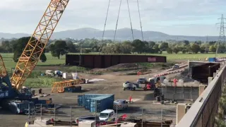 A huge iron girder is lifted into place for the dualling of Worcester's Carrington Bridge