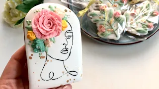 Flowers on the head. Cookies with royal icing.