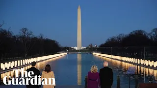 Biden and Harris hold vigil for 400,000 Covid victims as bells toll across US